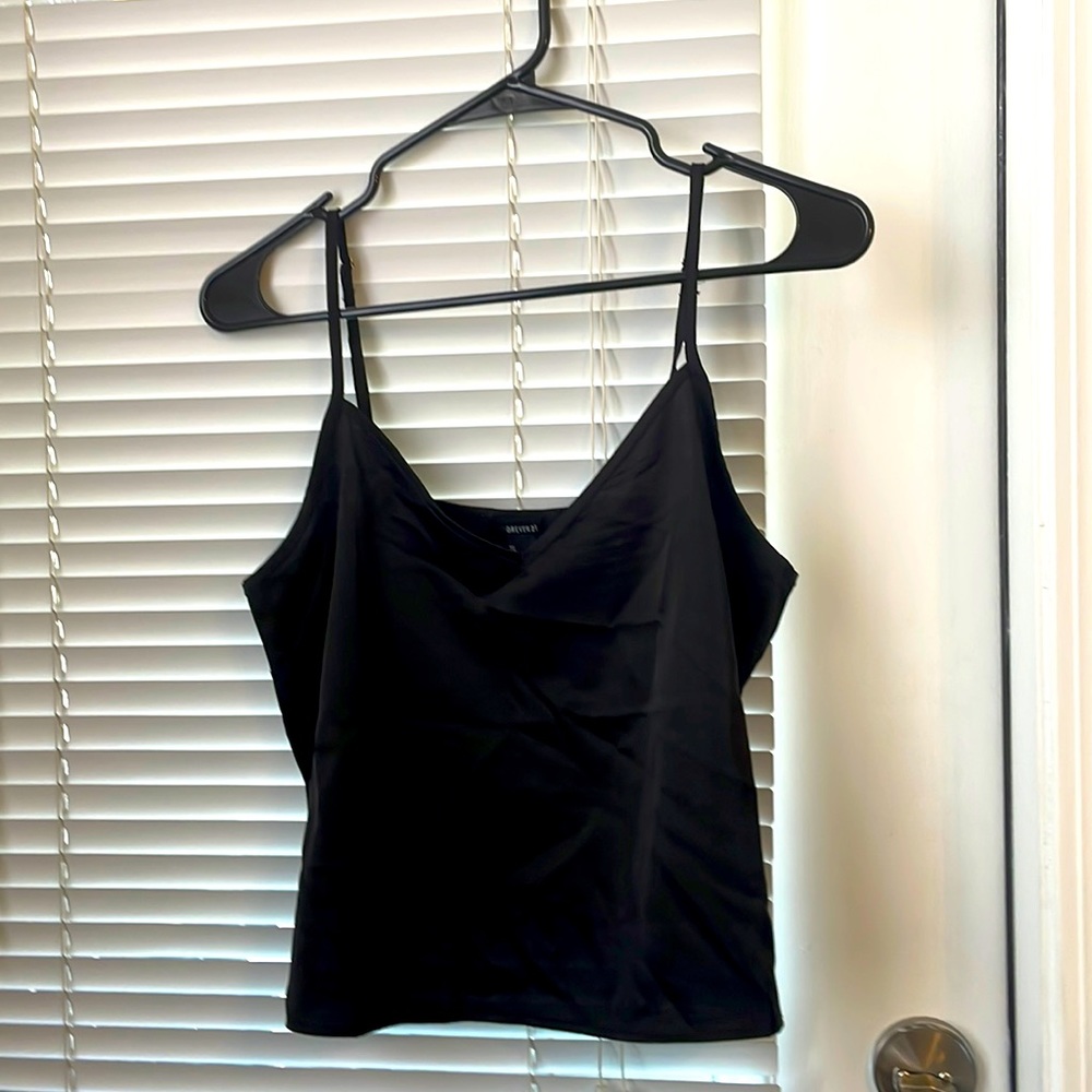 Size small, black silky Forever 21 tank top. Never worn.